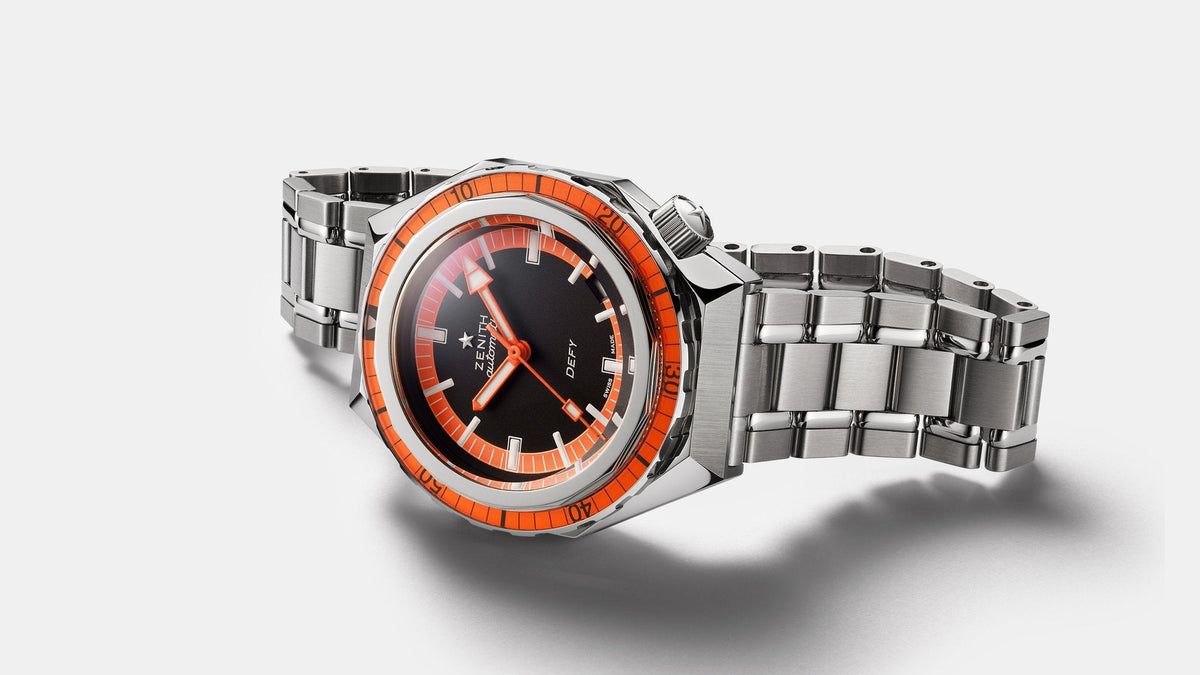 Zenith Defy Revival A3648 dive watch with black dial and orange accents, press still