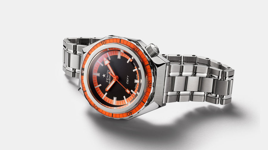 Zenith Defy Revival A3648 dive watch with black dial and orange accents, press still