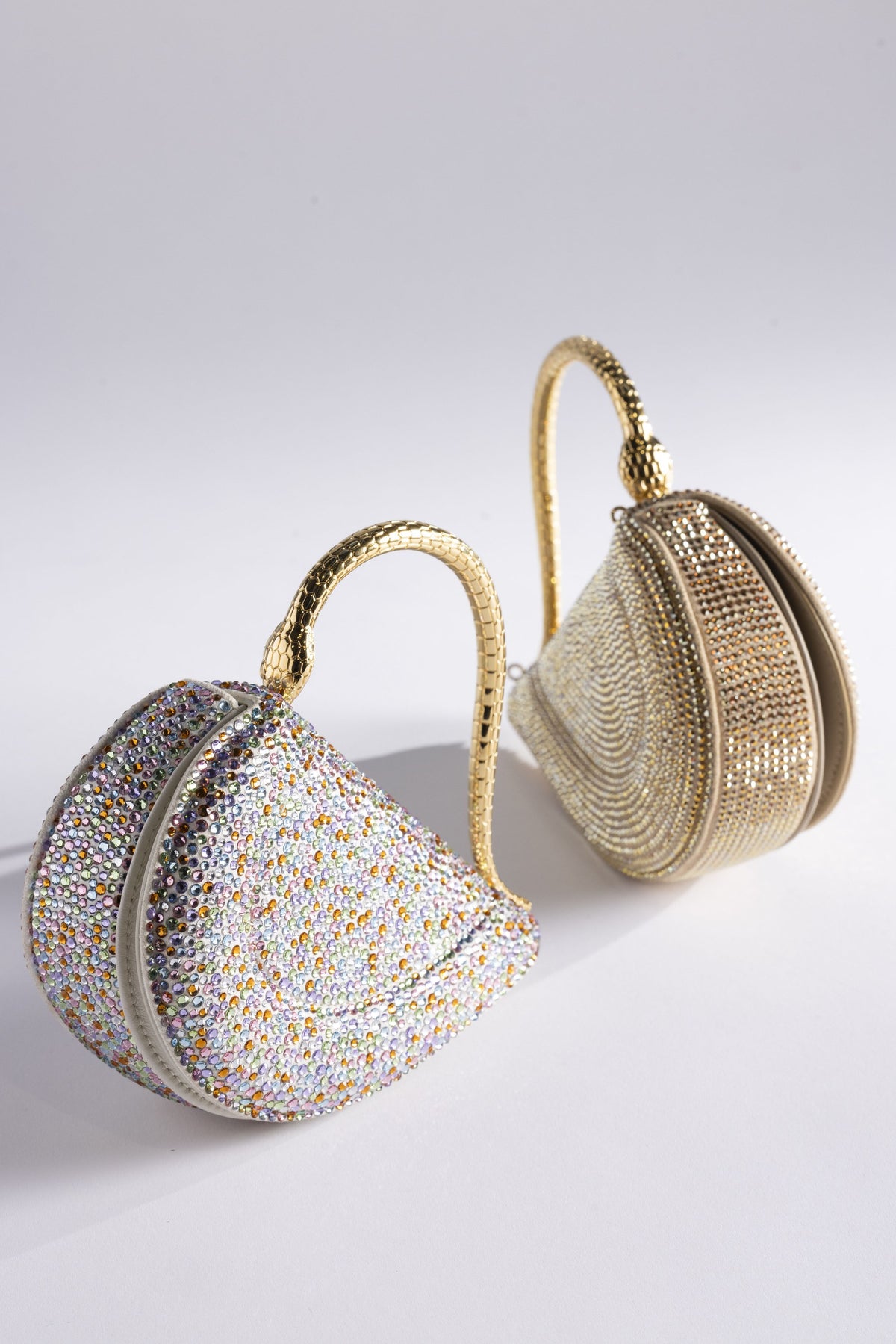 Bvlgari Serpenti Cuoricino minaudiere bags with gold snake handles